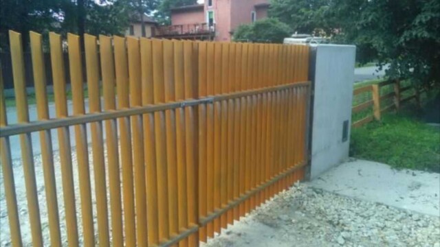 a fence with a gate and a fence